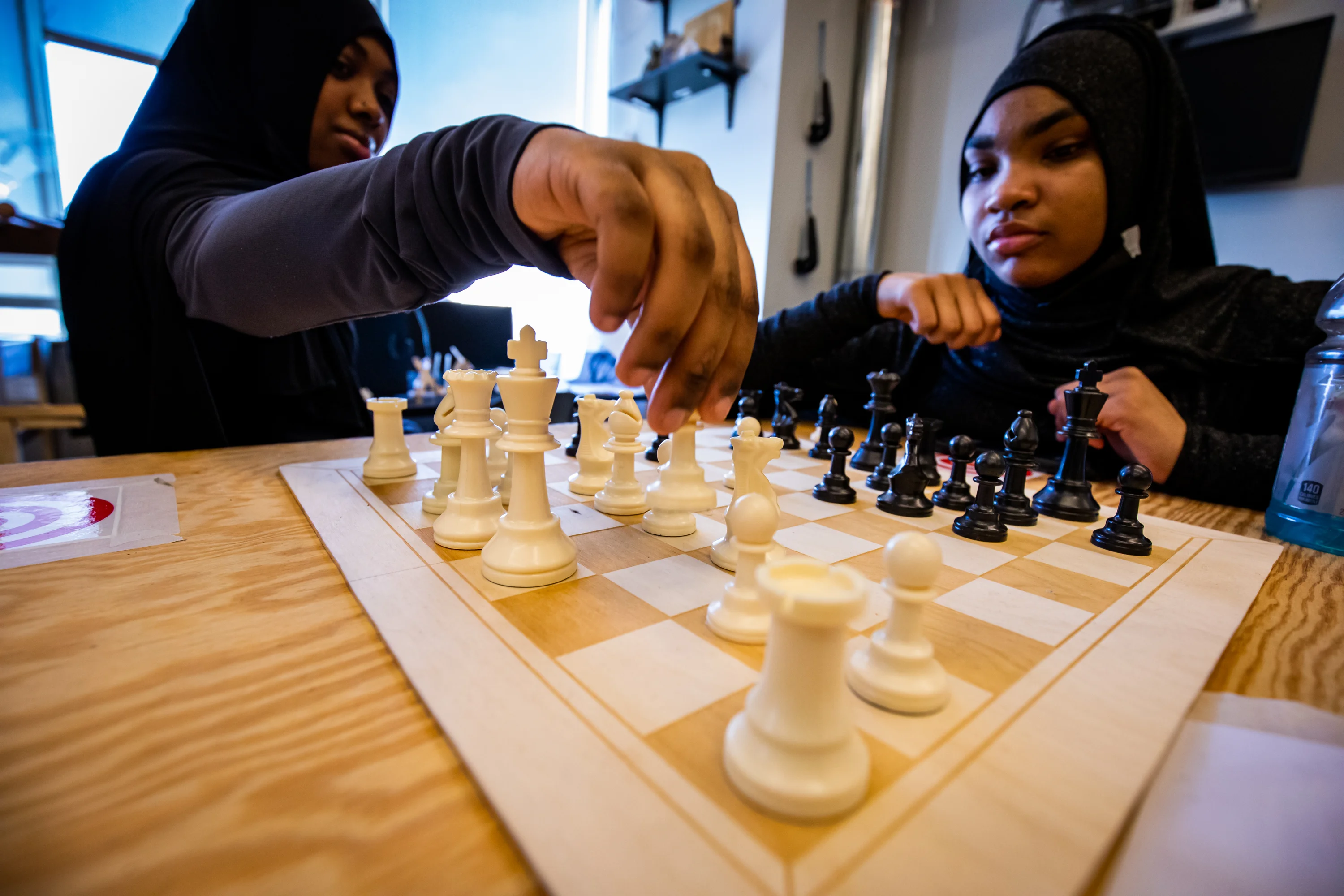 TECH Freire students playing chess